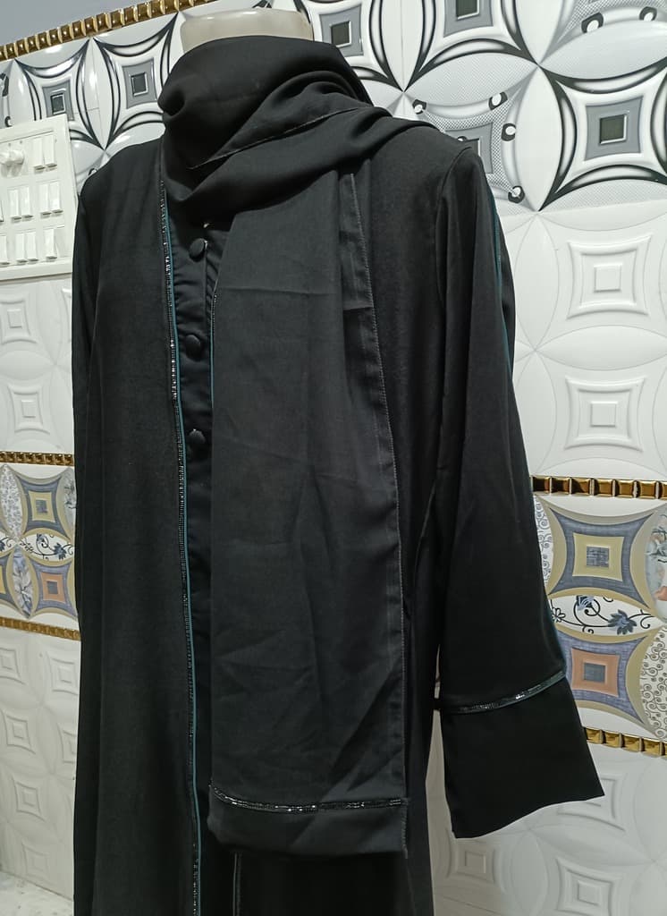 Black Sheet Abaya With Full Length Dark Cyan Piping And Mock Buttons image